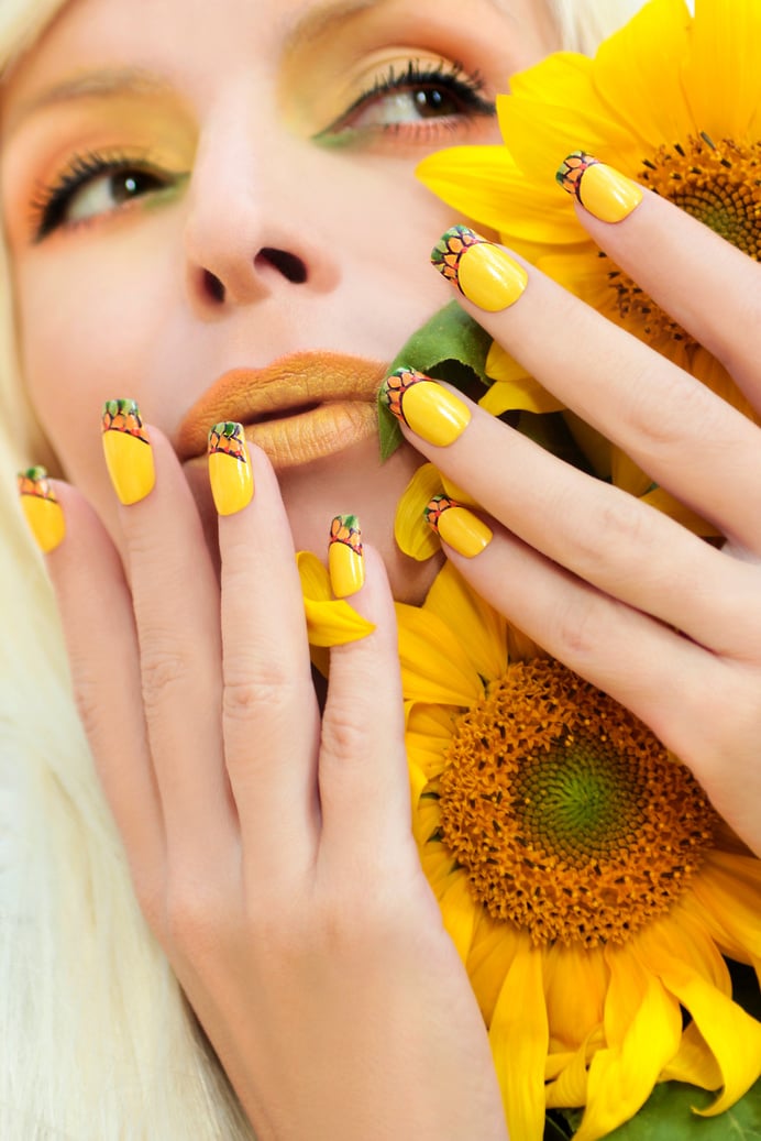 Sunflower nail design.